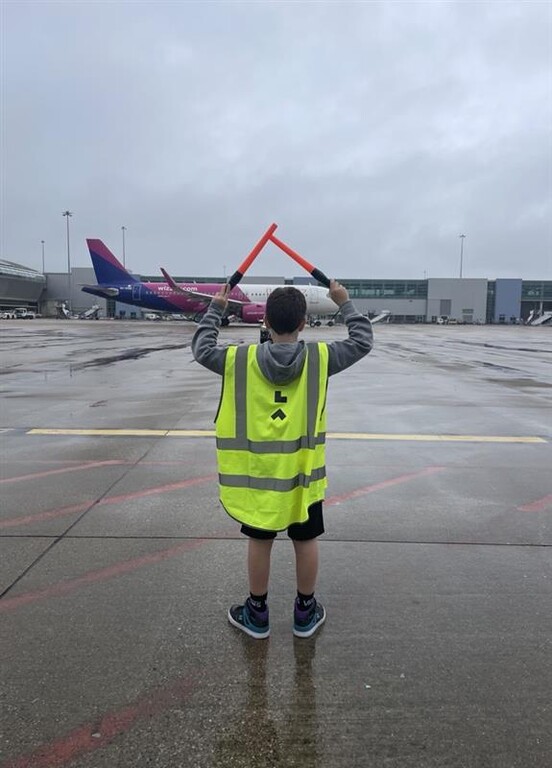 Seth Drinkell learning how to marshall an aircraft Seth Drinkell learning how to marshall an aircraft