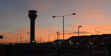 London Luton Airport control tower at sunset