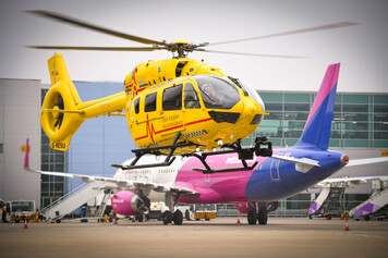 East Anglian Air Ambulance lands at London Luton Airport